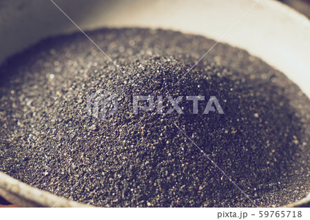small naturally tin ore sifting from streams 59765718