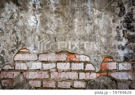 Old brick wall in a background image. Plastered Brickwall With Chipped Stucco Pieces. Red Textured 59769626