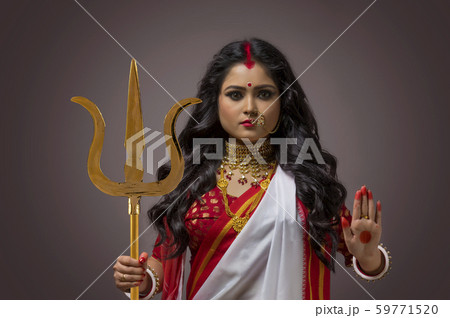 Potrait of a Bengali Married Woman as Goddess Durga Potrait of a Bengali Married Woman as Goddess Durga 59771520