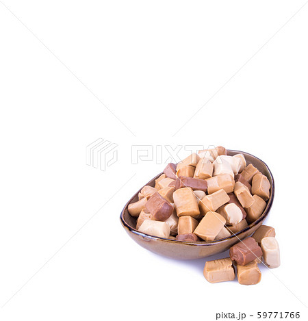 candies or caramel candies on a white background. candies or caramel candies on a white background. 59771766