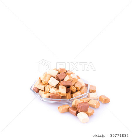 candies or caramel candies on a white background. candies or caramel candies on a white background. 59771852