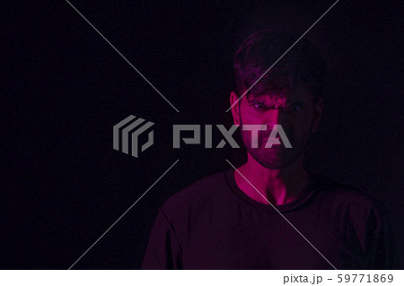 portrait of an angry man in red 59771869