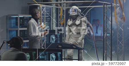 Astronaut walking on a treadmill 59772007
