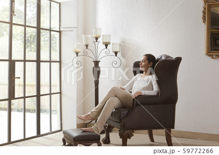 woman sitting and relaxing at home 59772266