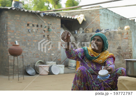 woman smiling and talking to someone woman smiling and talking to someone 59772797