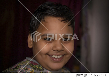 portrait of a young boy smiling portrait of a young boy smiling 59772824