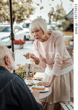 Nice aged woman arguing with her husband 59775653