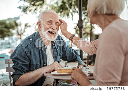 Joyful bearded aged man feeling absolutely happy 59775788