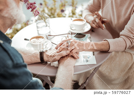 Top view of nice elderly peoples hands Top view of nice elderly peoples hands 59776027