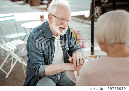 Nice aged man looking at his beloved wife Nice aged man looking at his beloved wife 59776039