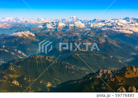 Aerial view on the Swiss Alps with snow peaks Aerial view on the Swiss Alps with snow peaks 59776885