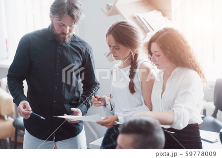 Design team of young people, concept of brainstorming planning. Design team of young people, concept of brainstorming planning. 59778009