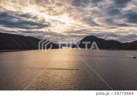 Scenery of Srinagarind dam in valley at sunset 59778664