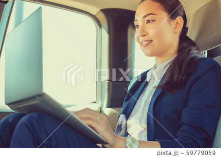 Close up of pleased woman that using computer Close up of pleased woman that using computer 59779059