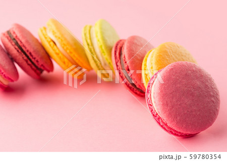 Sweet macarons on pink background Sweet macarons on pink background 59780354
