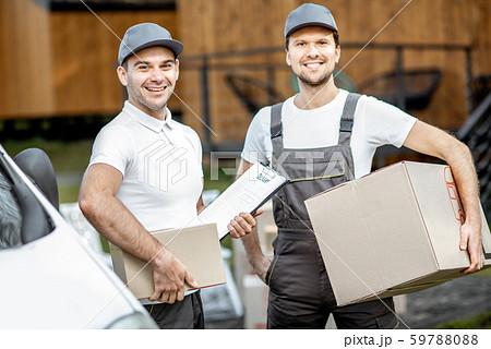 Delivery men portrait near the car Delivery men portrait near the car 59788088