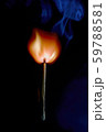 Safety match on black background with flaming head 59788581