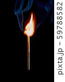 Safety match on black background with flaming head 59788582