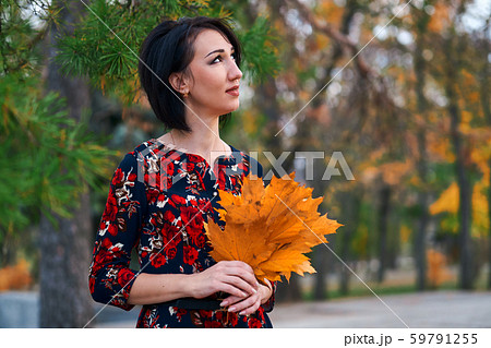 Beautiful elegant woman standing and posing with 59791255