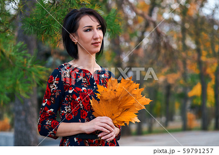 Beautiful elegant woman standing and posing with 59791257