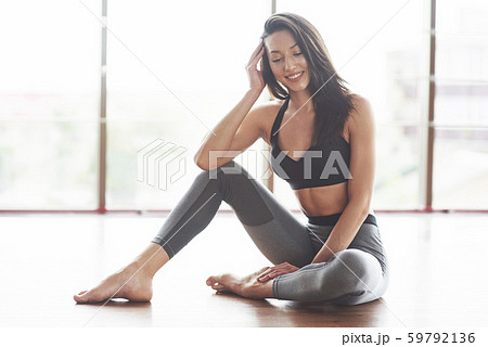 Young sexy sports woman in the gym. Young sexy sports woman in the gym. 59792136