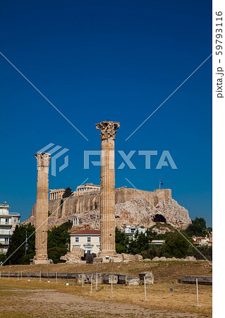 Ruins of the Temple of Olympian Zeus and the Acropolis at the center of the Athens city 59793116
