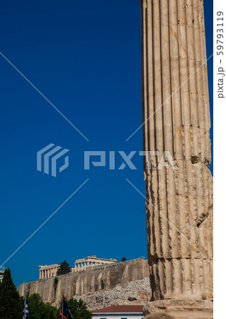 Ruins of the Temple of Olympian Zeus and the Acropolis at the center of the Athens city 59793119