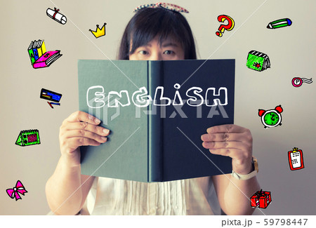 Thai girl holding book with illustrations flying 59798447