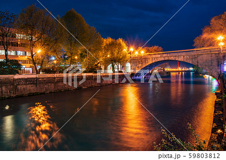 View of the stone bridge over the river at night 59803812