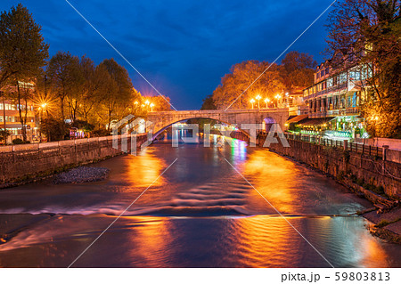 View of the stone bridge over the river at night 59803813