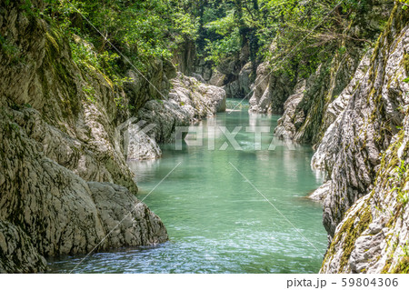 Mountain river in the stone gorge. Mountain river in the stone gorge. 59804306