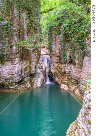 Mountain river and waterfall with clear turquoise water Mountain river and waterfall with clear turquoise water 59804478