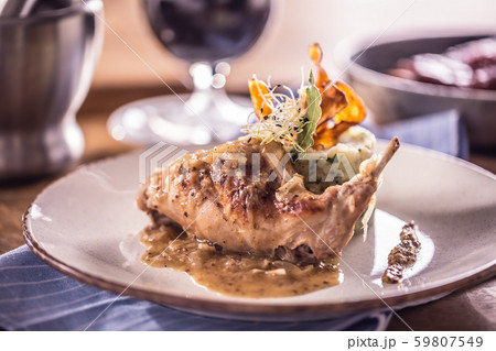 Rabbit leg with mashes potatoes and decoration on 59807549