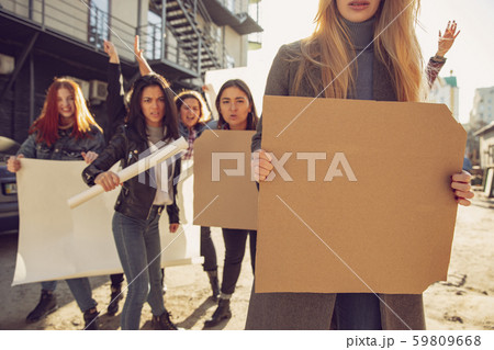 Young people protesting of women rights and equality on the street 59809668