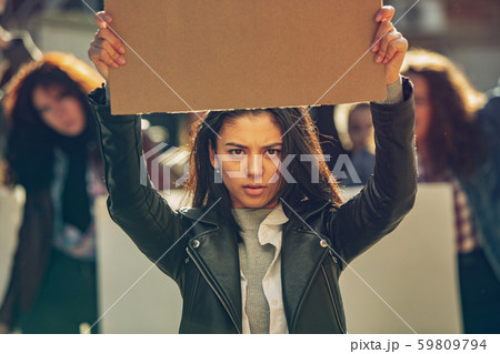 Young people protesting of women rights and equality on the street 59809794