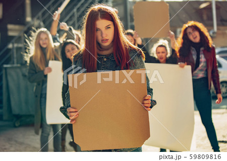 Young people protesting of women rights and equality on the street 59809816