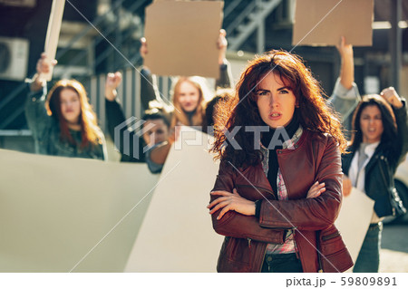 Young people protesting of women rights and equality on the street 59809891