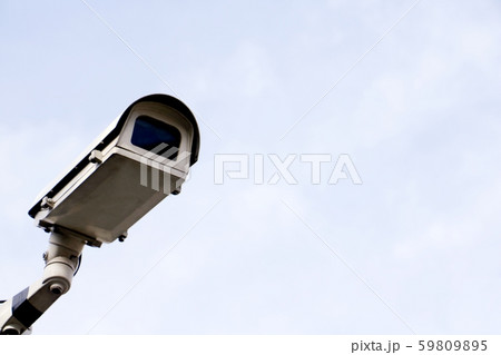 CCTV security camera operating in home.Image of CCTV security camera on white background. CCTV security camera operating in home.Image of CCTV security camera on white background. 59809895