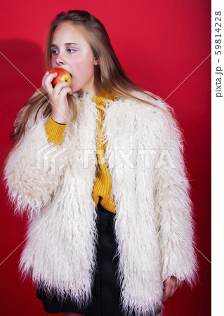 young pretty emitonal posing teenage girl on bright red background, happy smiling lifestyle people young pretty emitonal posing teenage girl on bright red background, happy smiling lifestyle people 59814228
