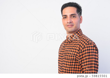 Closeup profile view of handsome Persian hipster man looking at camera 59815501