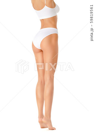 Slim woman's legs isolated on white background 59819561