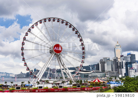 Ferris wheel and skyscraper in Hong Kong. Ferris wheel and skyscraper in Hong Kong. 59819810