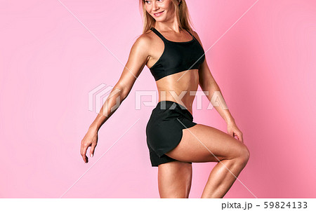 Active girl training over pink wall Active girl training over pink wall 59824133