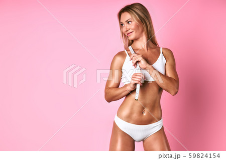 Charming bodybuilder over pink wall 59824154