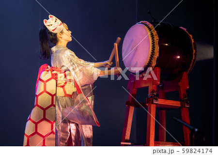Traditional Japanese performance. Actress in white Traditional Japanese performance. Actress in white 59824174