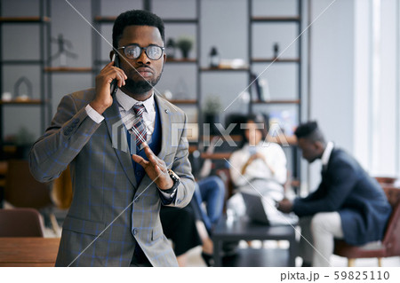 Portrait of serious african man in tuxedo 59825110