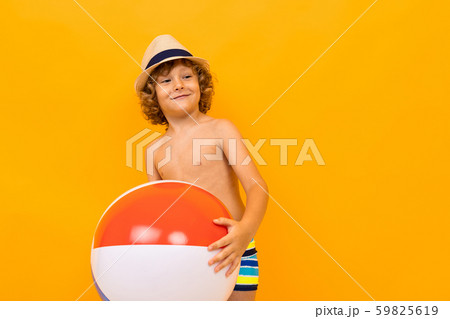 guy in swimming pools with a swimming ball 59825619
