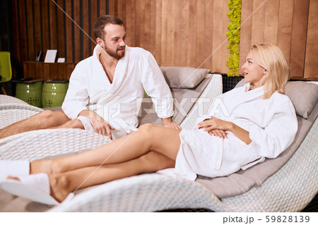 Female and male relaxing after massage in spa center 59828139