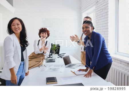 business and education concept. young leaders applause in office 59828995