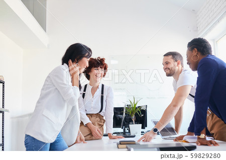Multietnhic business team having fun in office 59829280